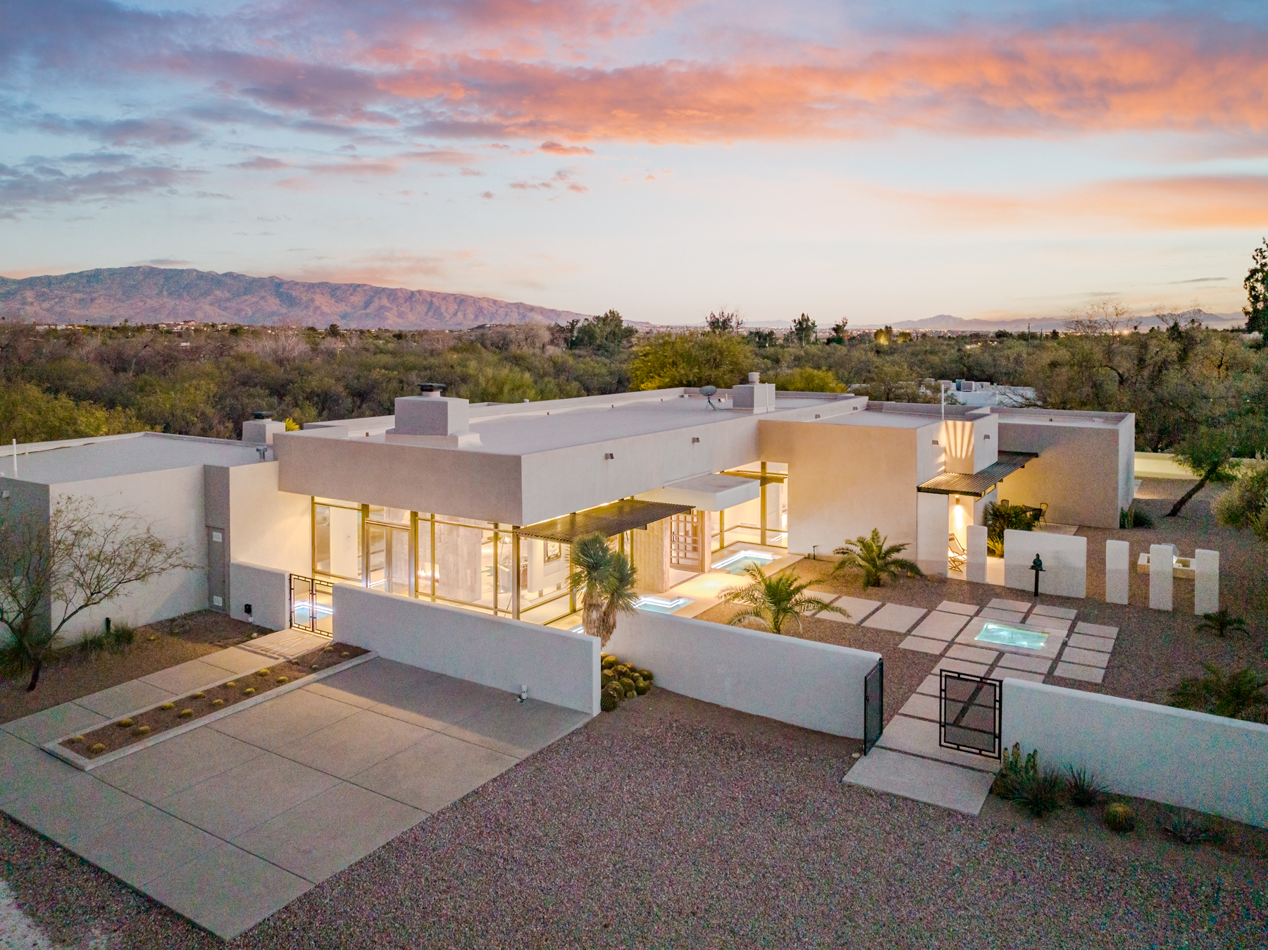 The Robert Bacon residence near Sabino Creek — aerial at dusk, photographed by Shadowpoint