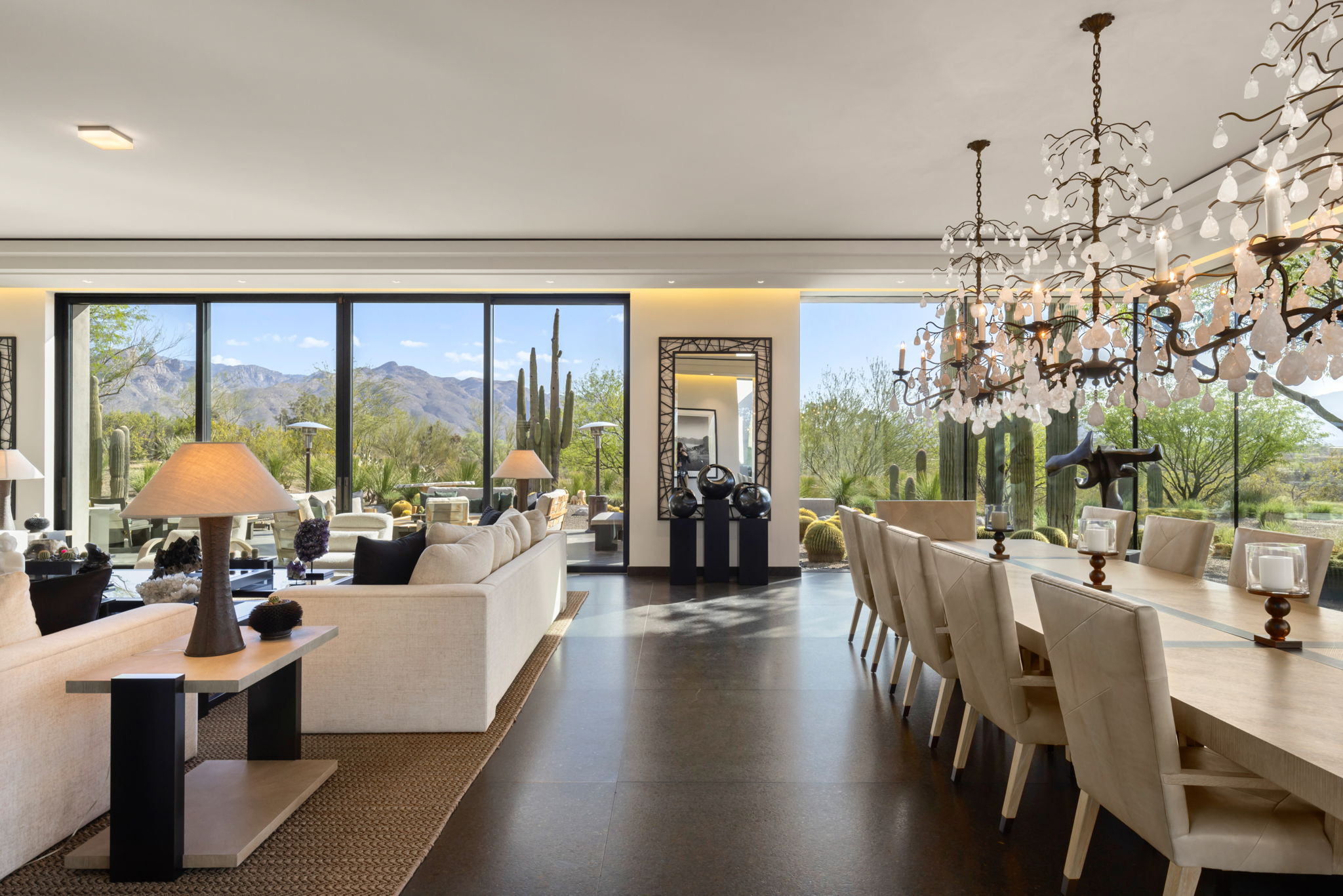 Canyon Ranch Estate — open living and dining with chandeliers and mountain views
