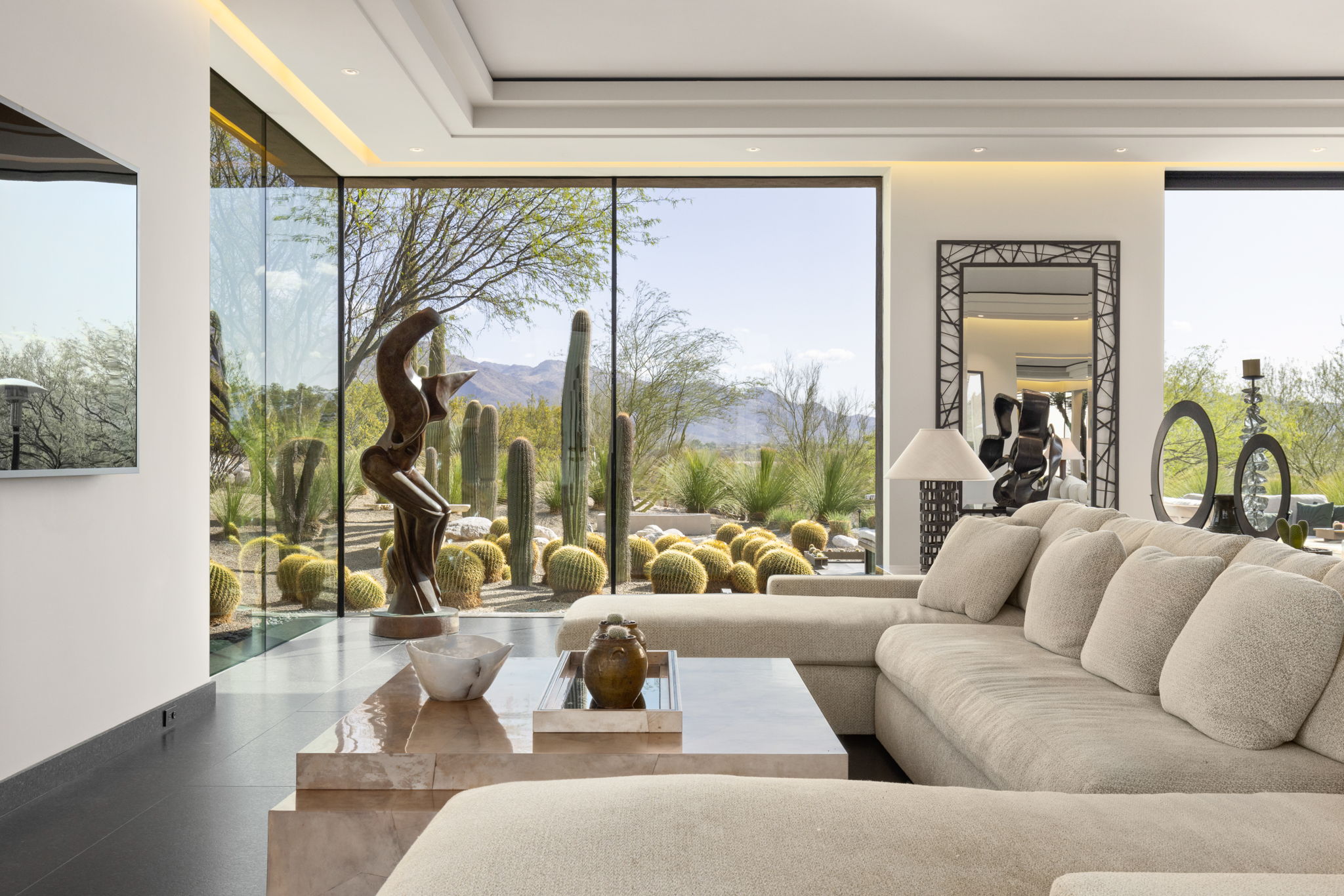 Canyon Ranch Estate — living room with bouclé sectional and glass walls