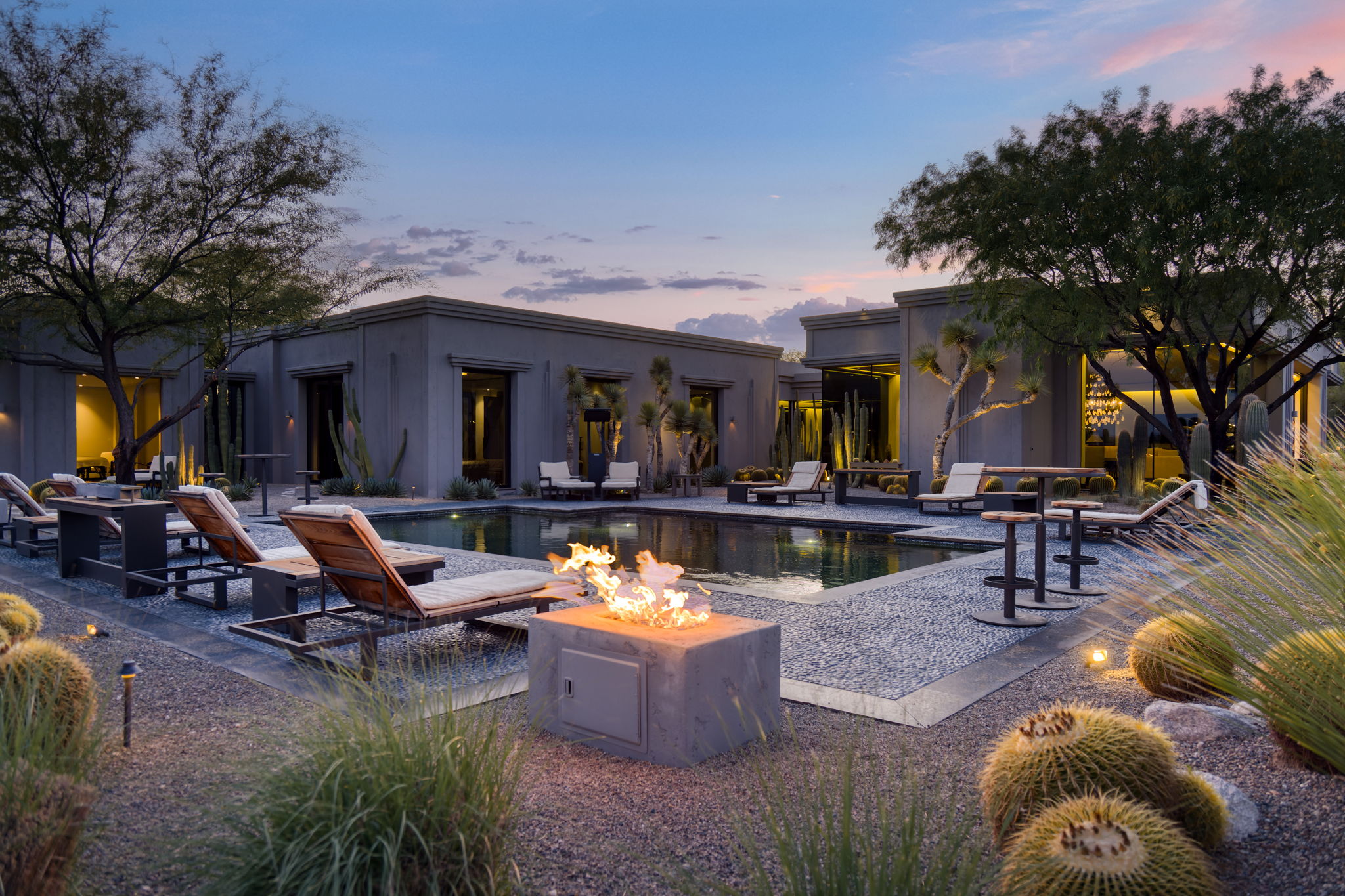 Canyon Ranch Estate — pool with fire feature, dusk