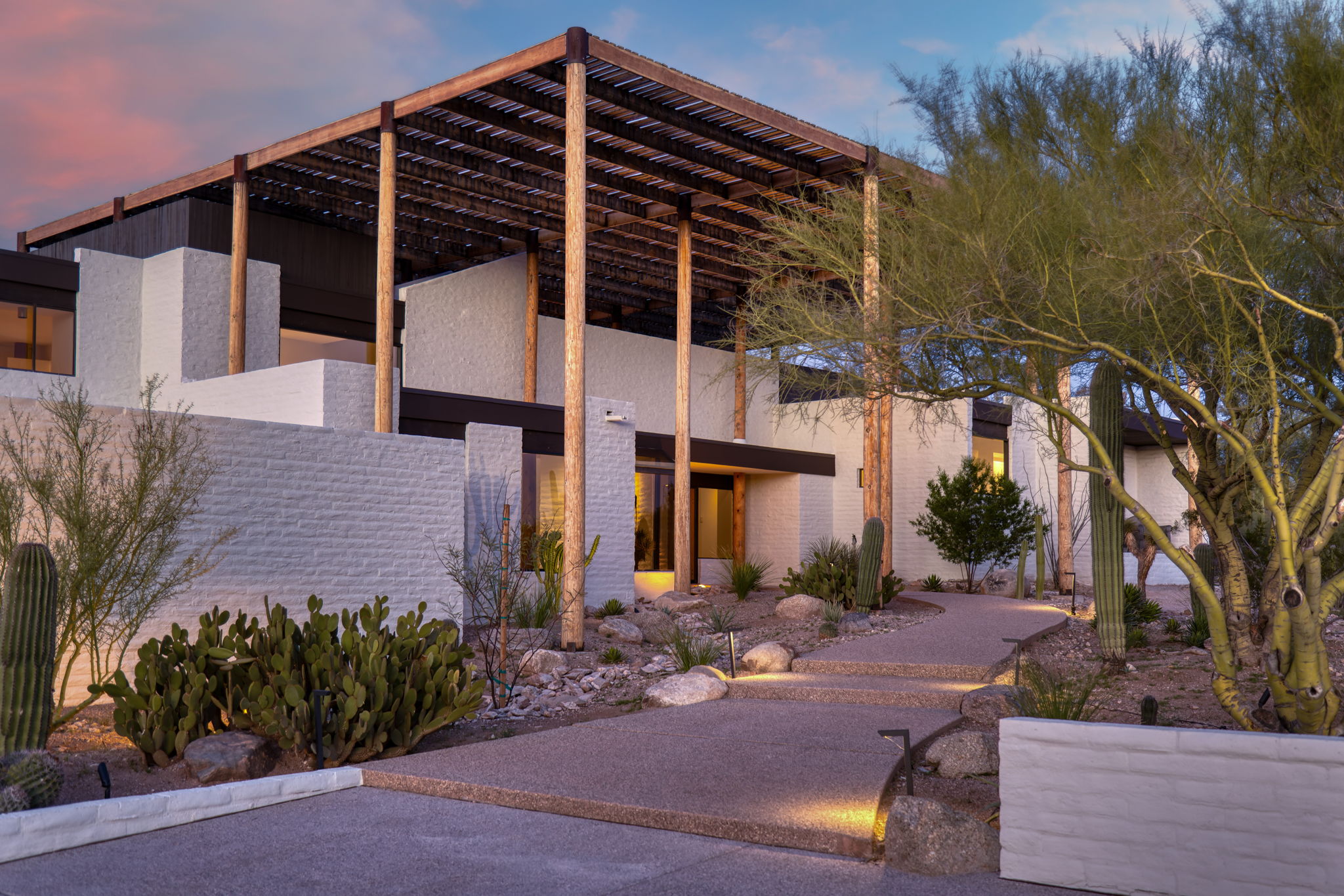 The Ramada House — entry at dusk