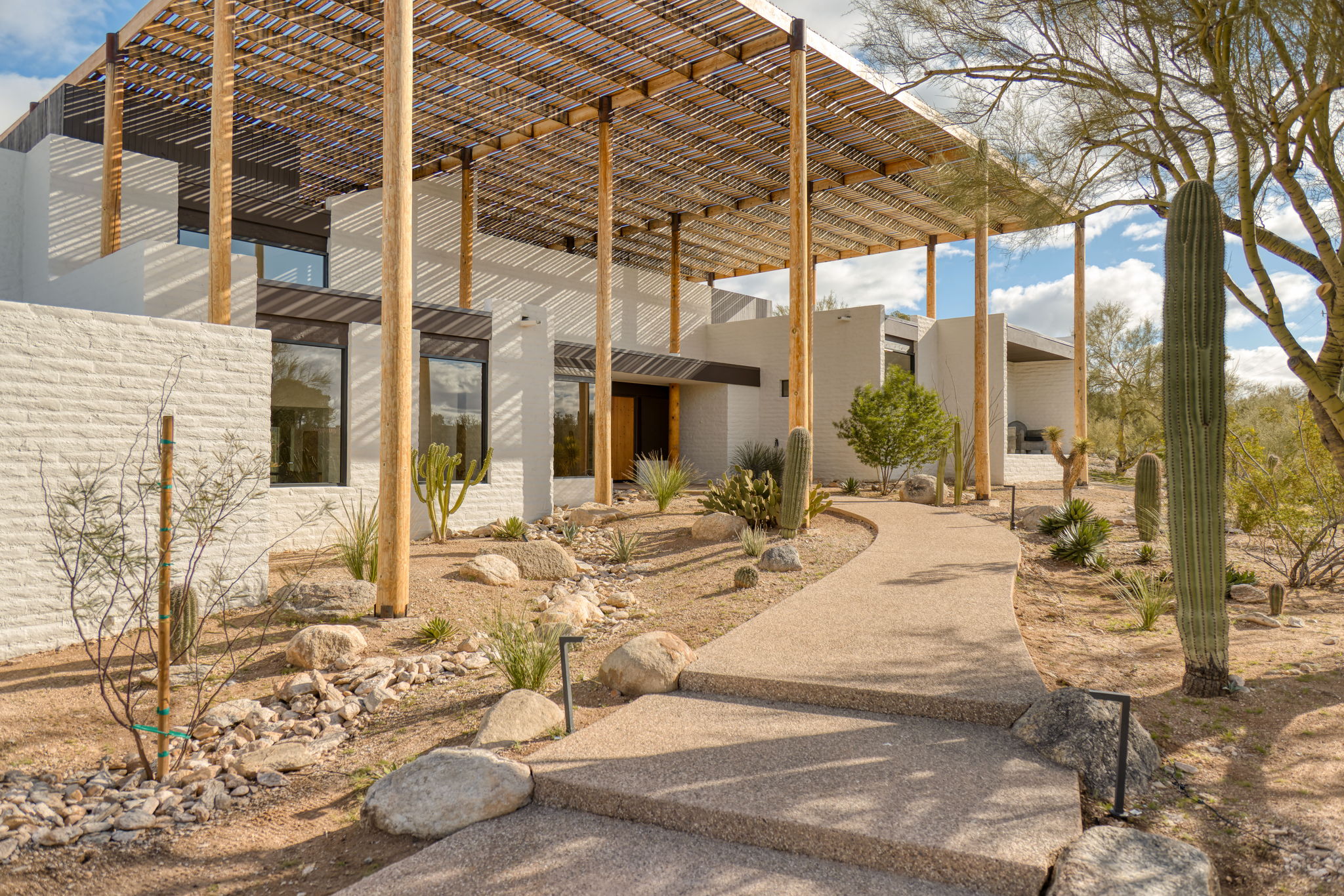 The Ramada House — entry pergola in daylight