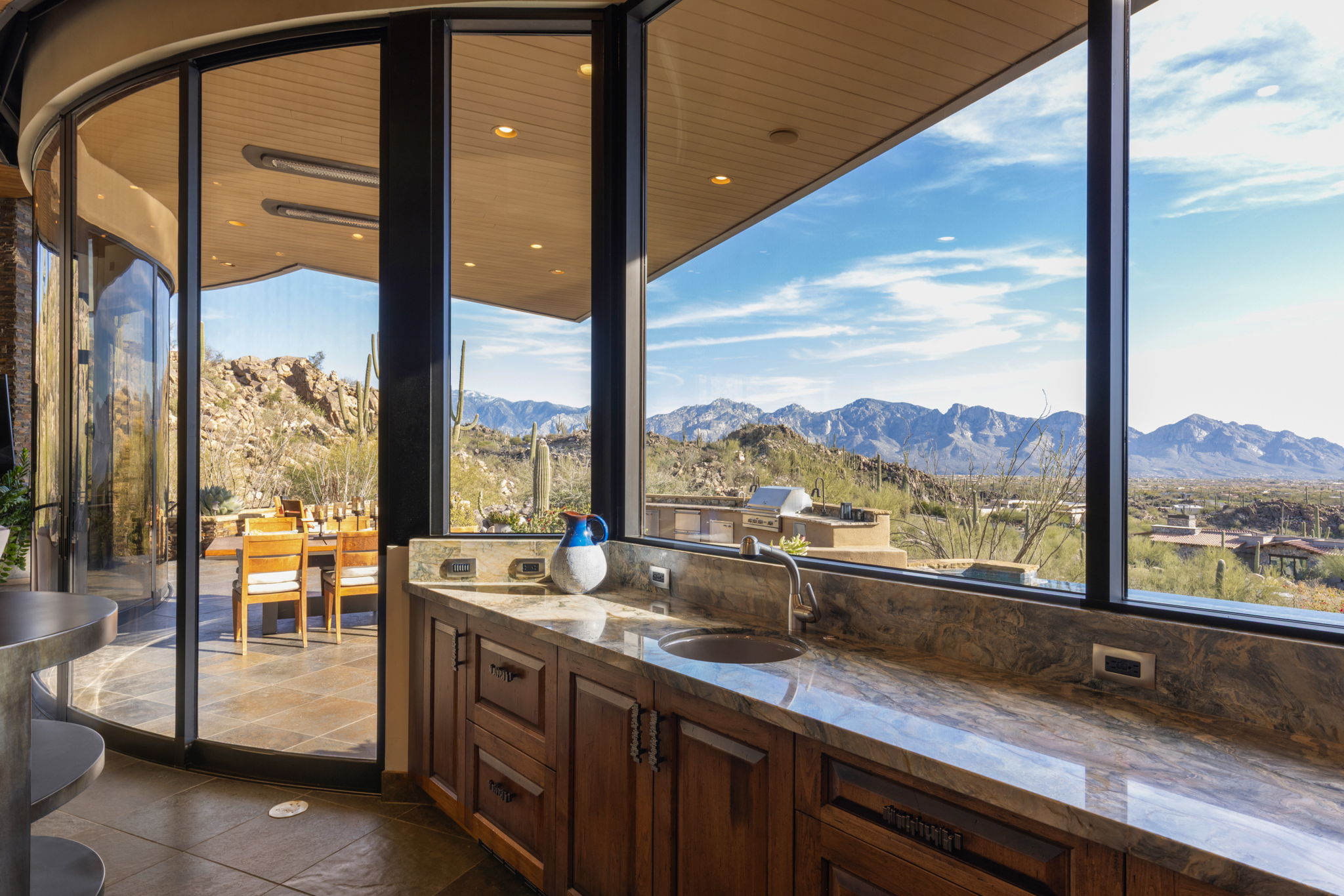 Tortolita Mountain Residence — open dining and living with mountain views