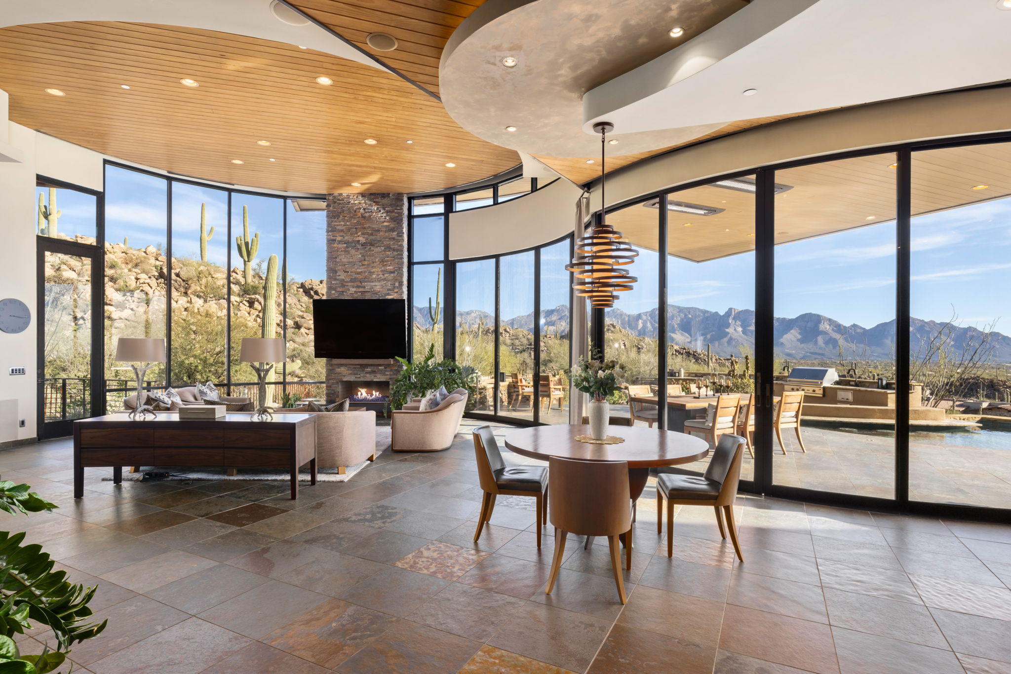 Tortolita Mountain Residence — kitchen and breakfast nook with chandelier and Catalina views